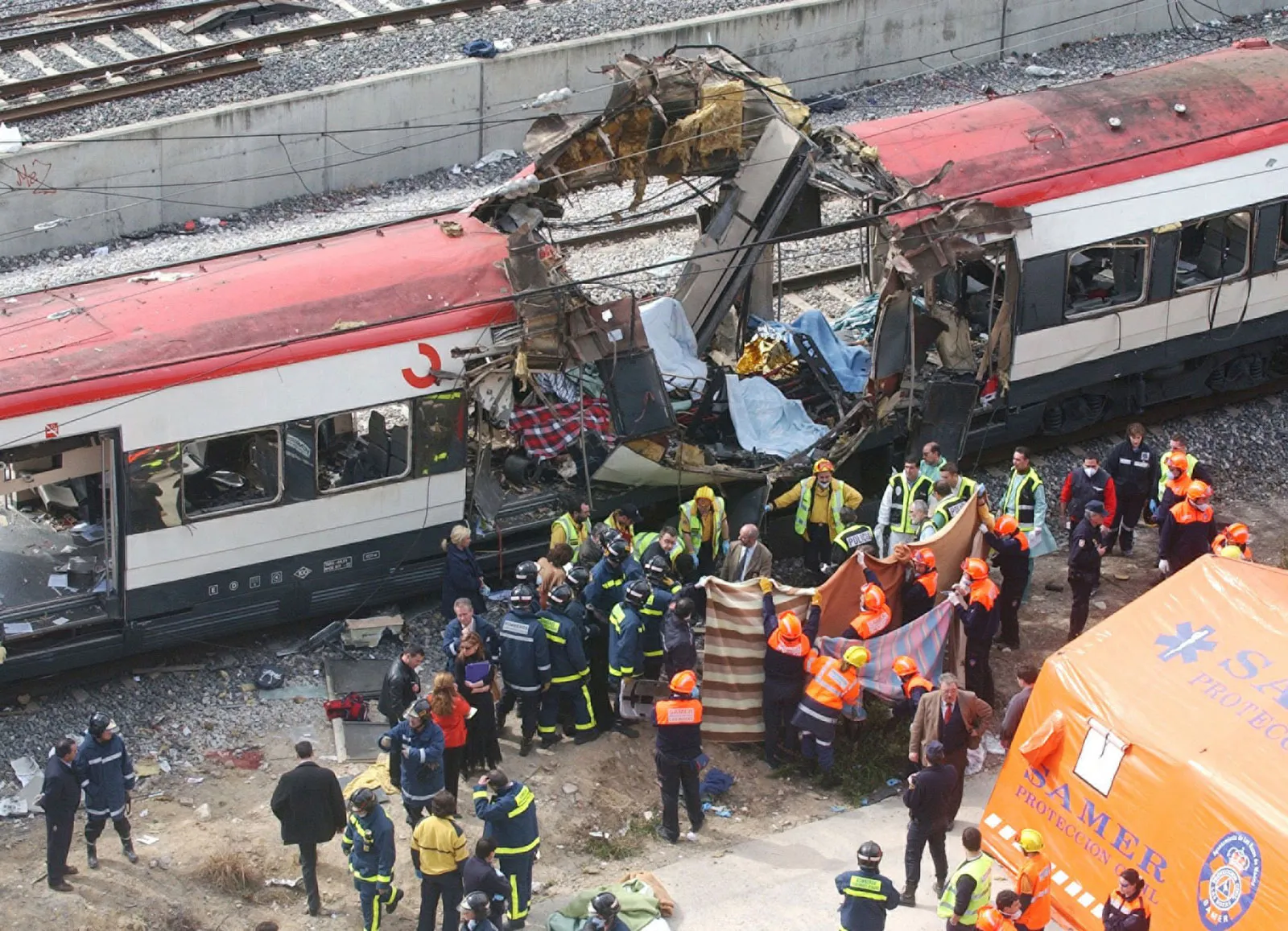 Rescue workers bodies victims bombing train attacks March 11 2004 Rescue workers bodies victims bombing train attacks March 11 2004