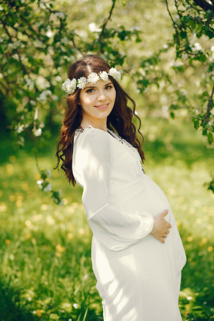 beautiful young pregnant girl long white dress wreath her head beautiful young pregnant girl long white dress wreath her head