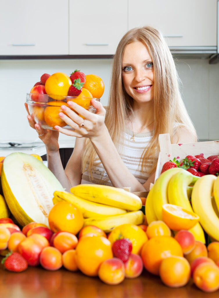 happy woman with various fruits happy woman with various fruits